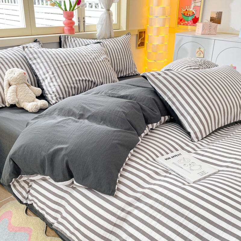 A super soft and simple vertical pink striped four-piece set for girls