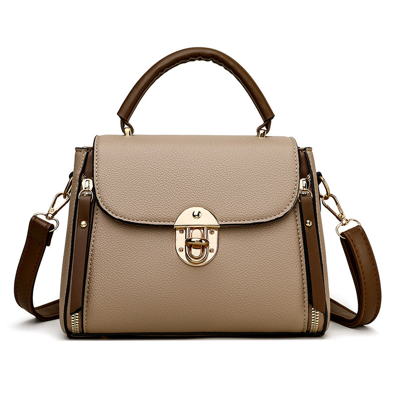 A large-capacity hand-held crossbody bag with a lock