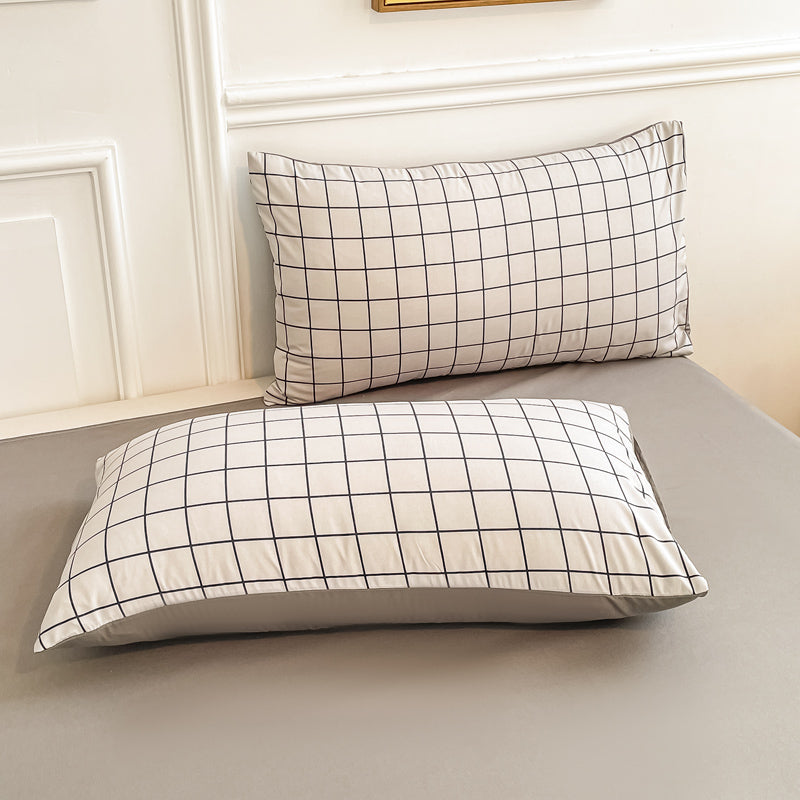 Button-style washed cotton four-piece bedding set