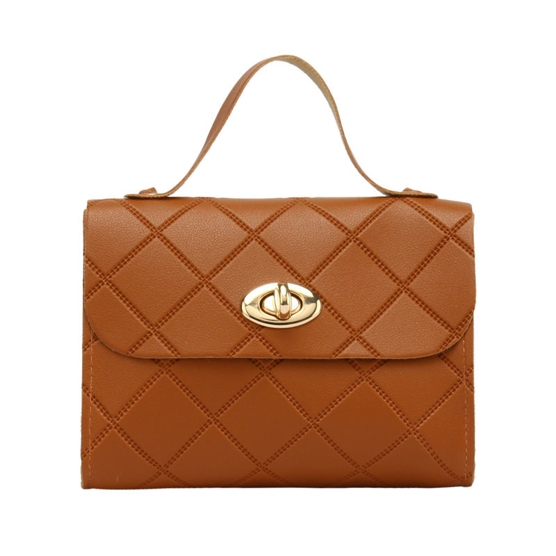 A small square bag with diamond-shaped stripes