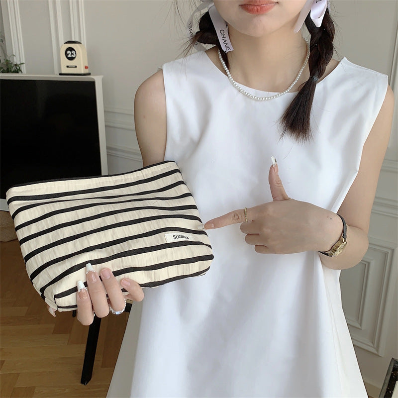 Knitted striped makeup bag