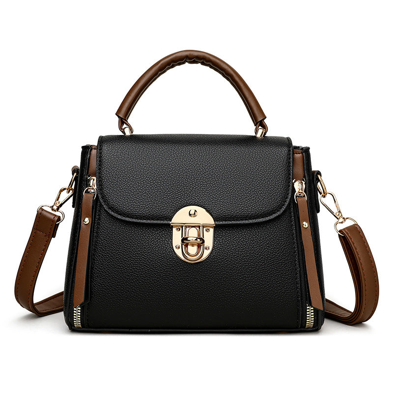 A large-capacity hand-held crossbody bag with a lock