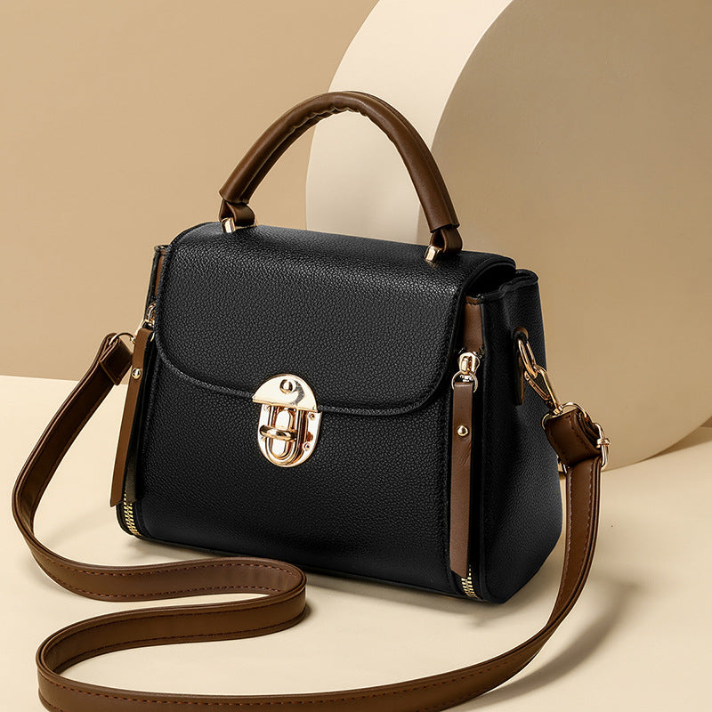 A large-capacity hand-held crossbody bag with a lock