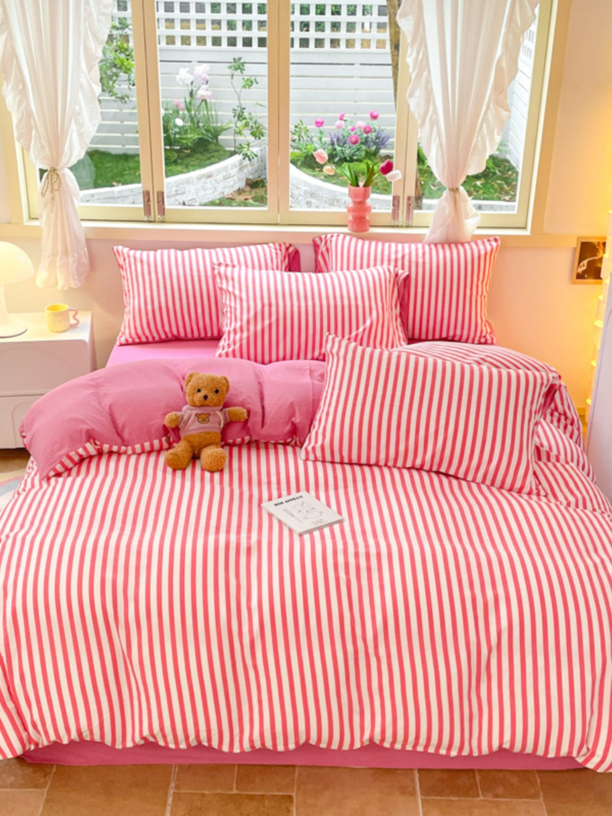 A super soft and simple vertical pink striped four-piece set for girls