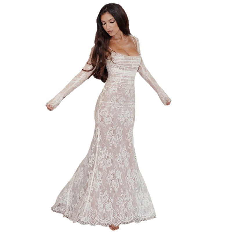 A long-sleeved hooded lace halter dress
