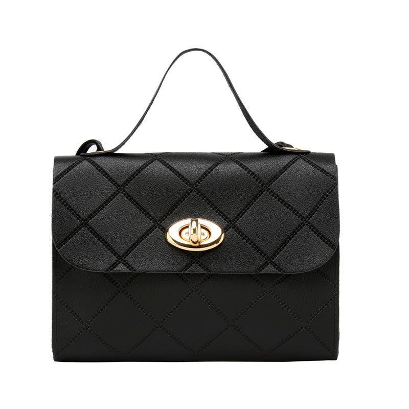 A small square bag with diamond-shaped stripes