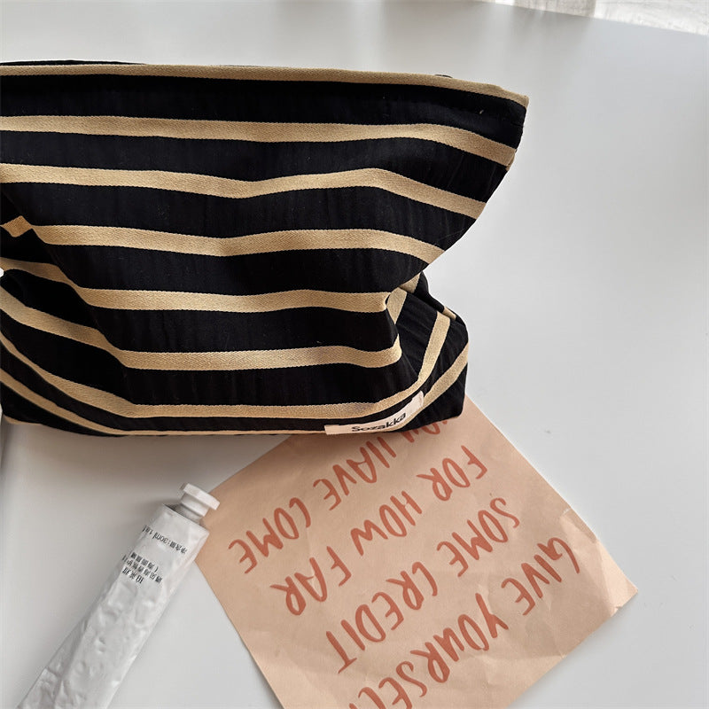 Knitted striped makeup bag