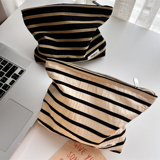 Knitted striped makeup bag