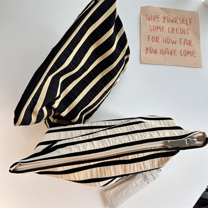 Knitted striped makeup bag
