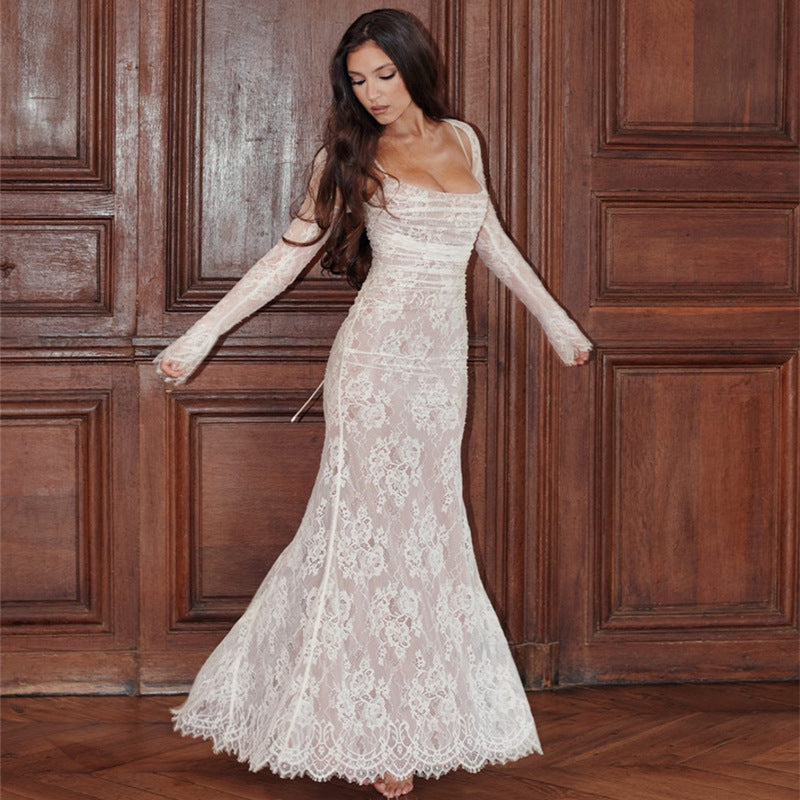 A long-sleeved hooded lace halter dress