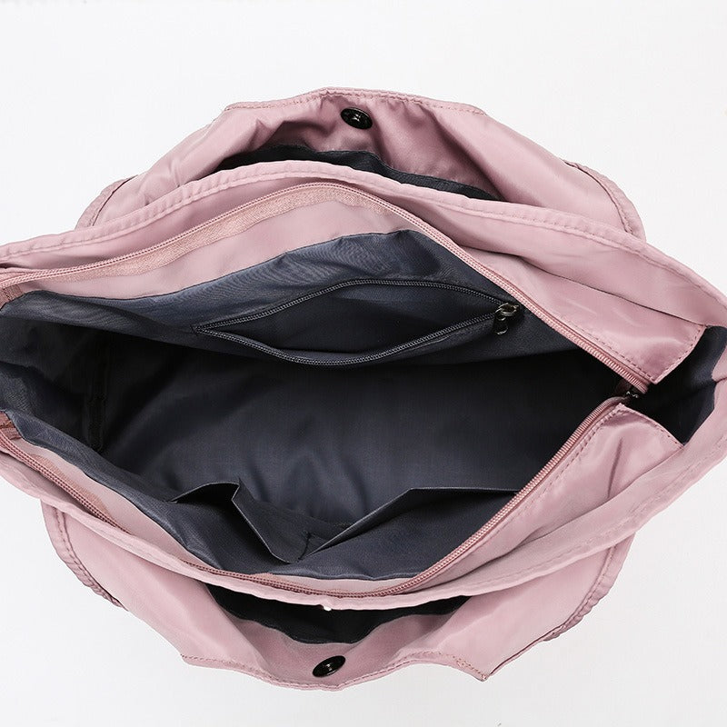 Carry an Oxford cloth travel bag