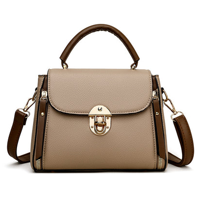 A large-capacity hand-held crossbody bag with a lock