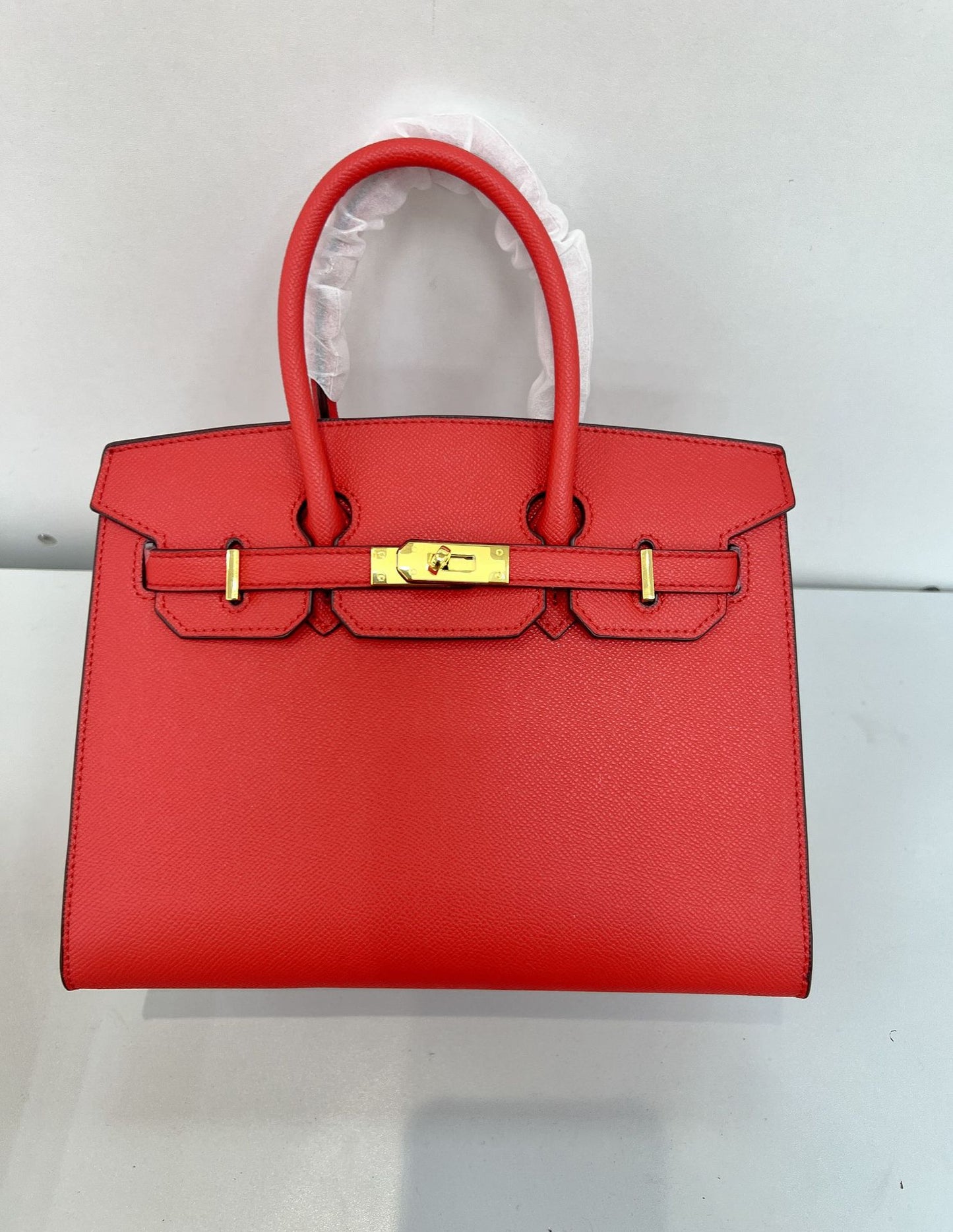 Outer sewn commuter single-shoulder handbag