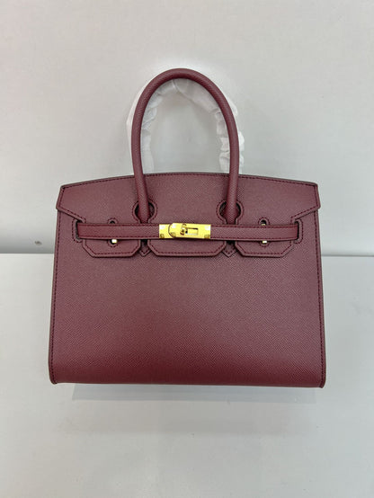 Outer sewn commuter single-shoulder handbag