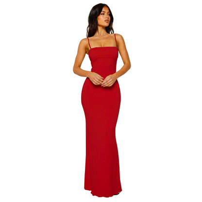 Sexy, form-fitting backless halter solid color dress
