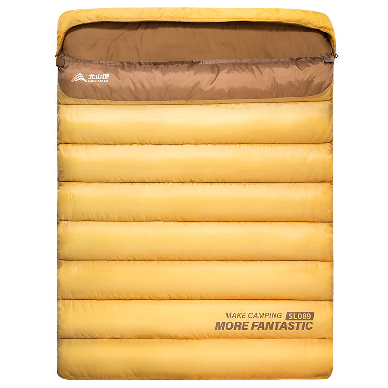 A thick portable sleeping bag for double camping to keep warm in winter