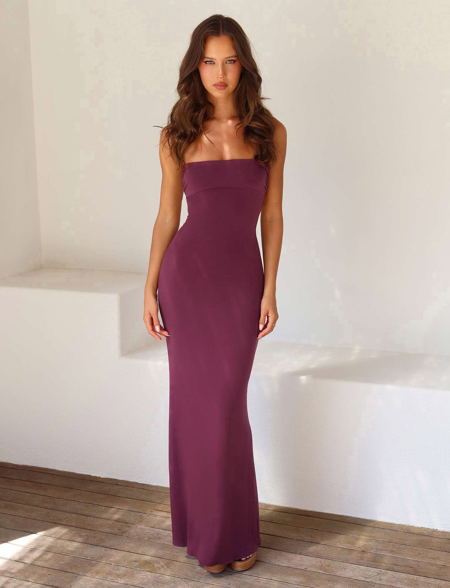 Sexy, form-fitting backless halter solid color dress