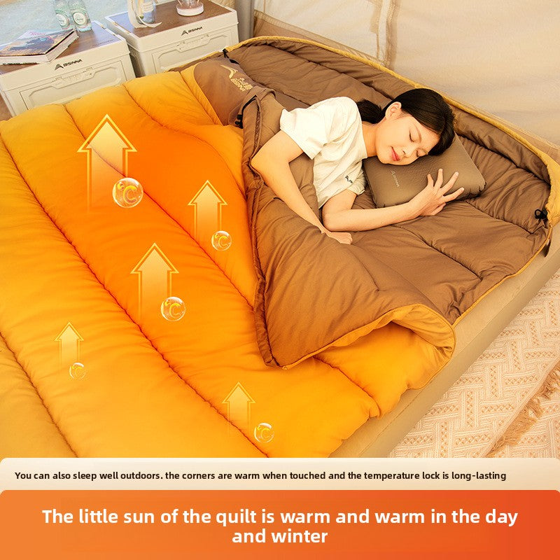 A thick portable sleeping bag for double camping to keep warm in winter
