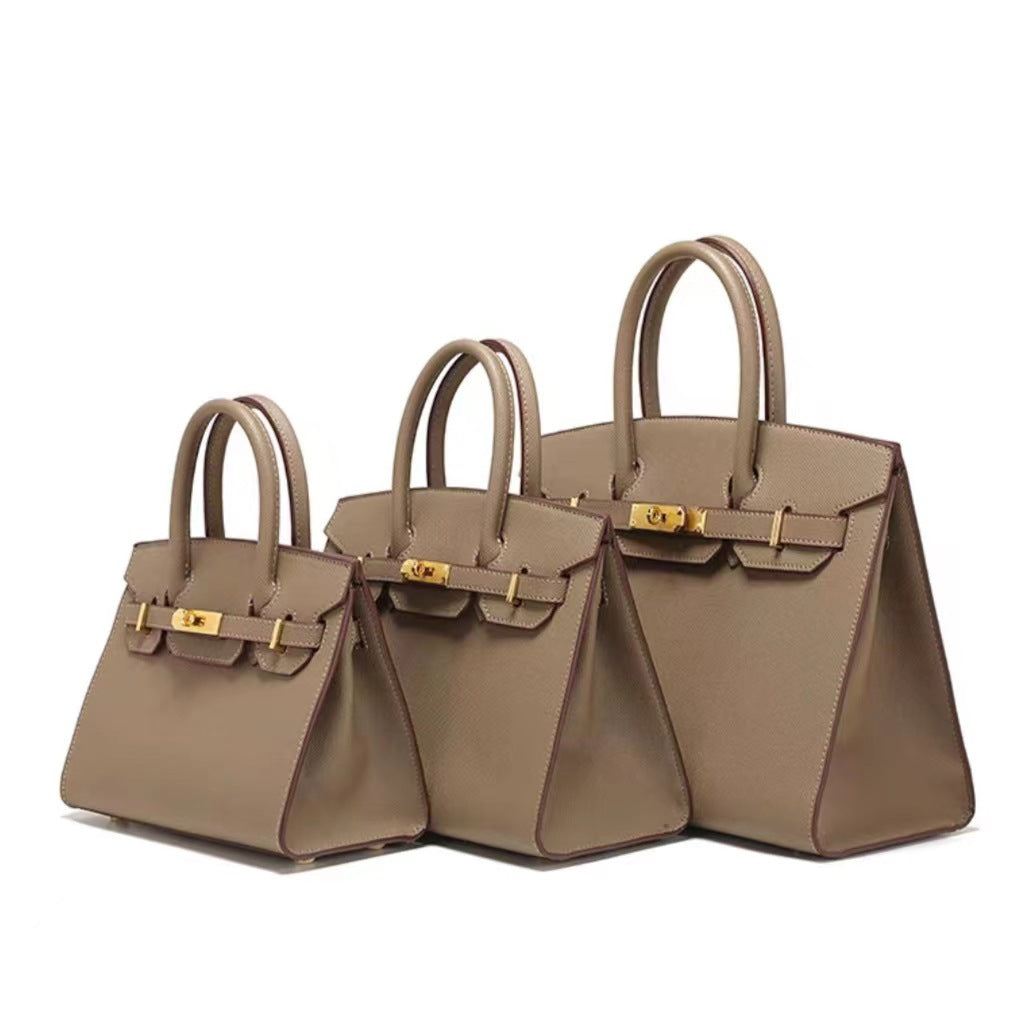 Outer sewn commuter single-shoulder handbag