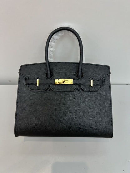 Outer sewn commuter single-shoulder handbag