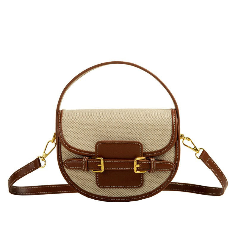 Retro-textured crossbody saddle bag